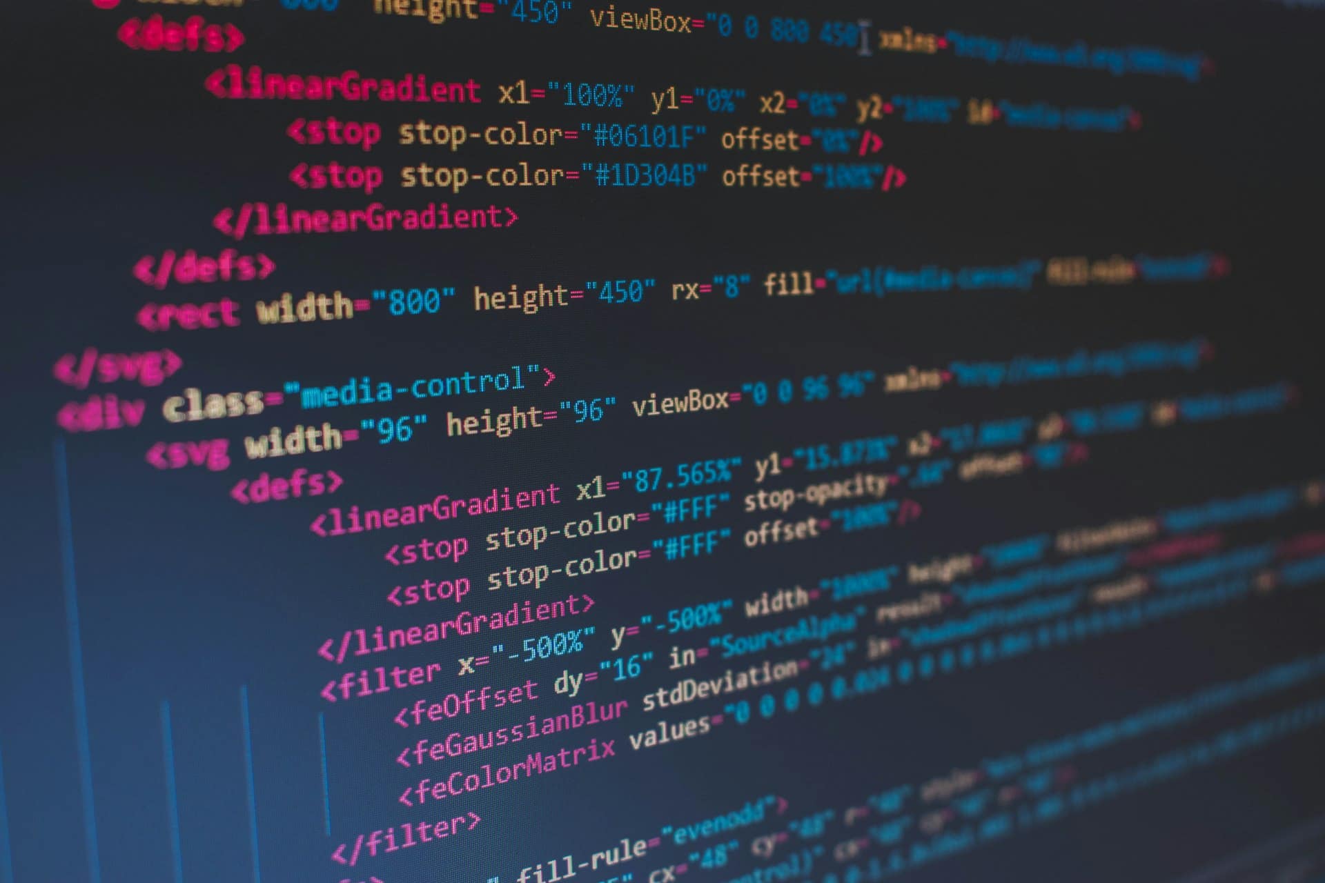 Close-up of code on a dark screen